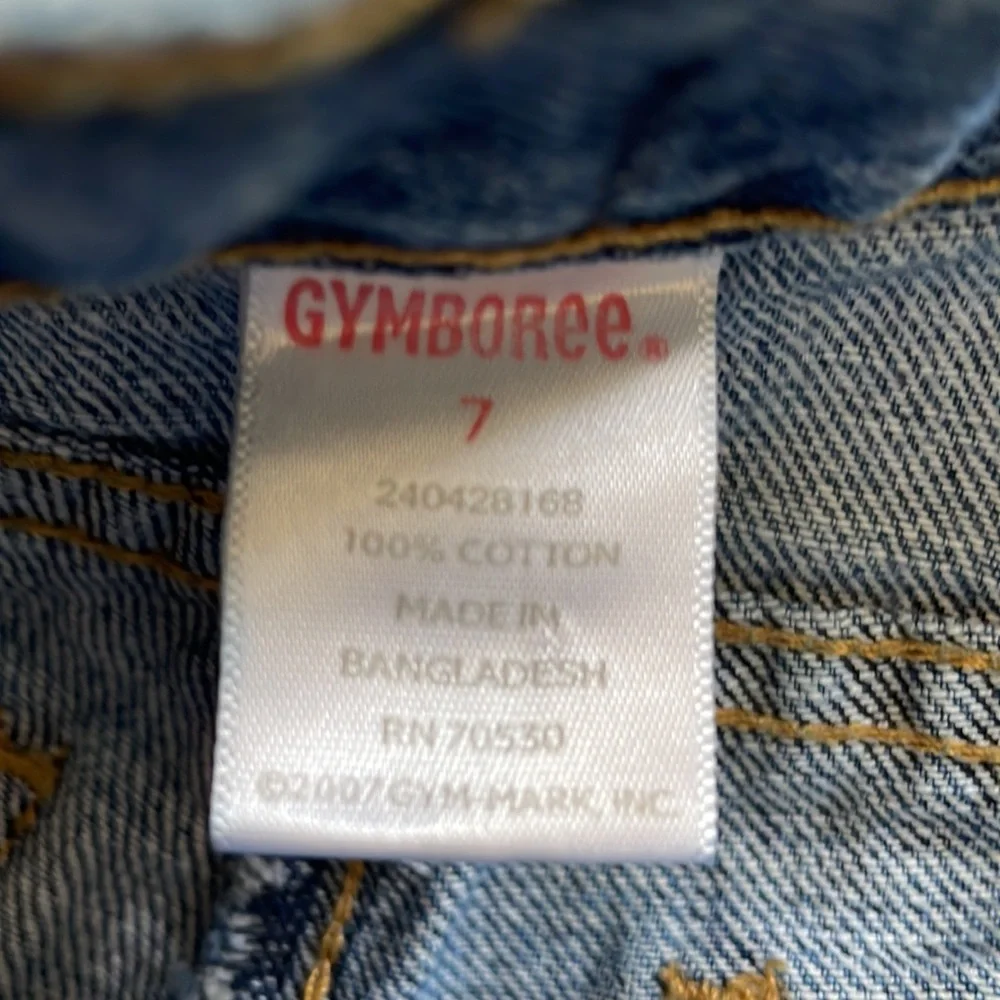 Gymboree flared jeans with gem buttons.  Girls size 7